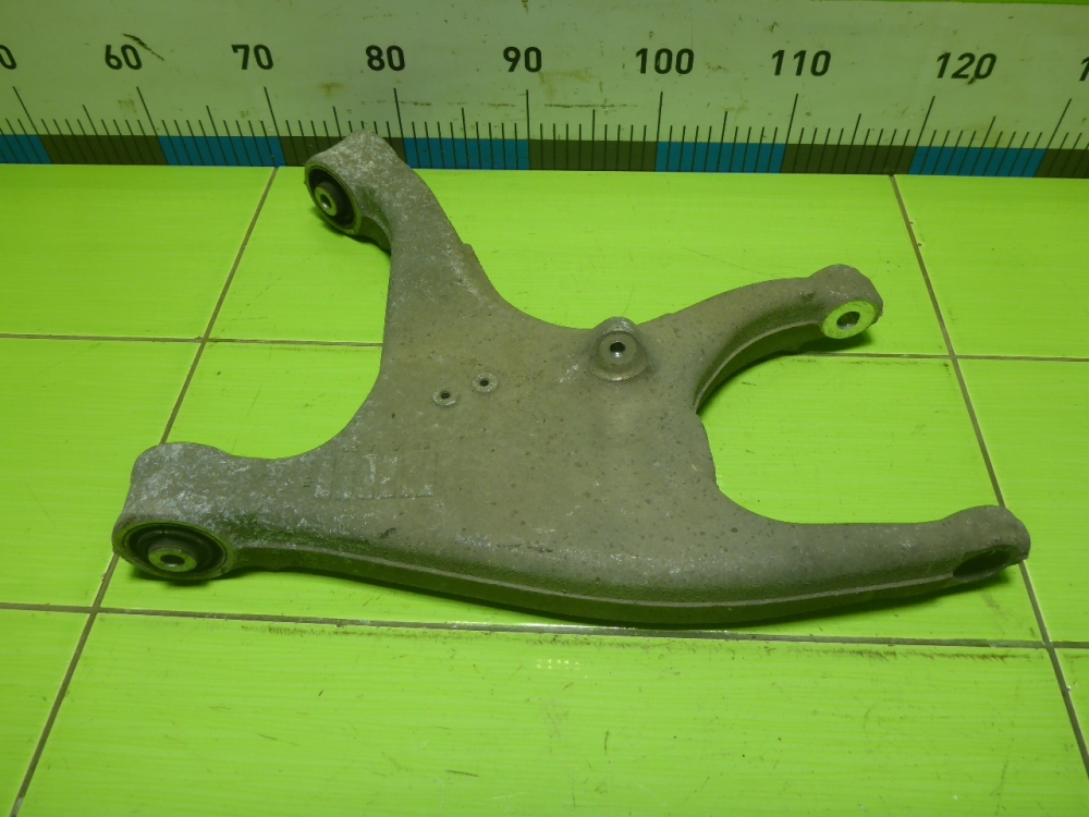 Рычаг задний нижний