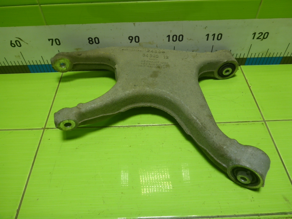 Рычаг задний нижний