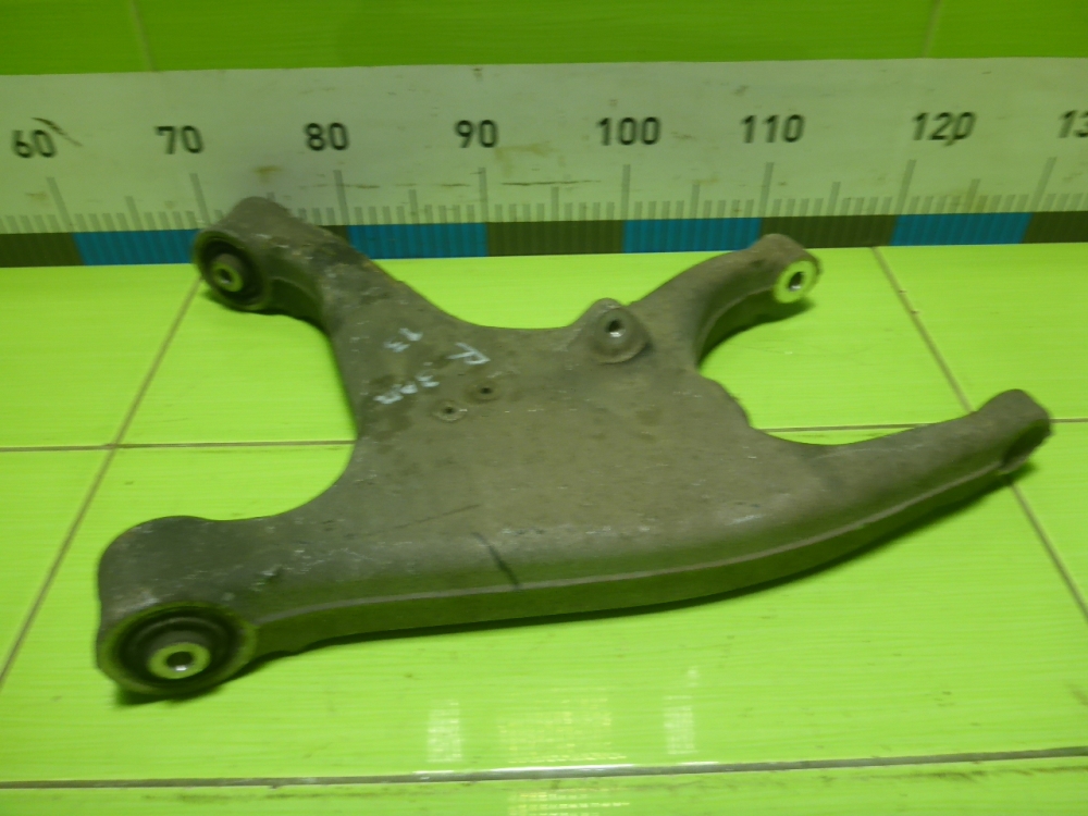 Рычаг задний нижний