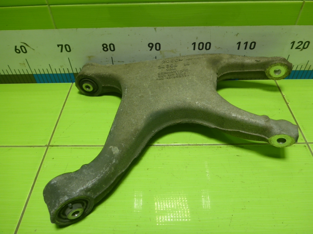 Рычаг задний нижний