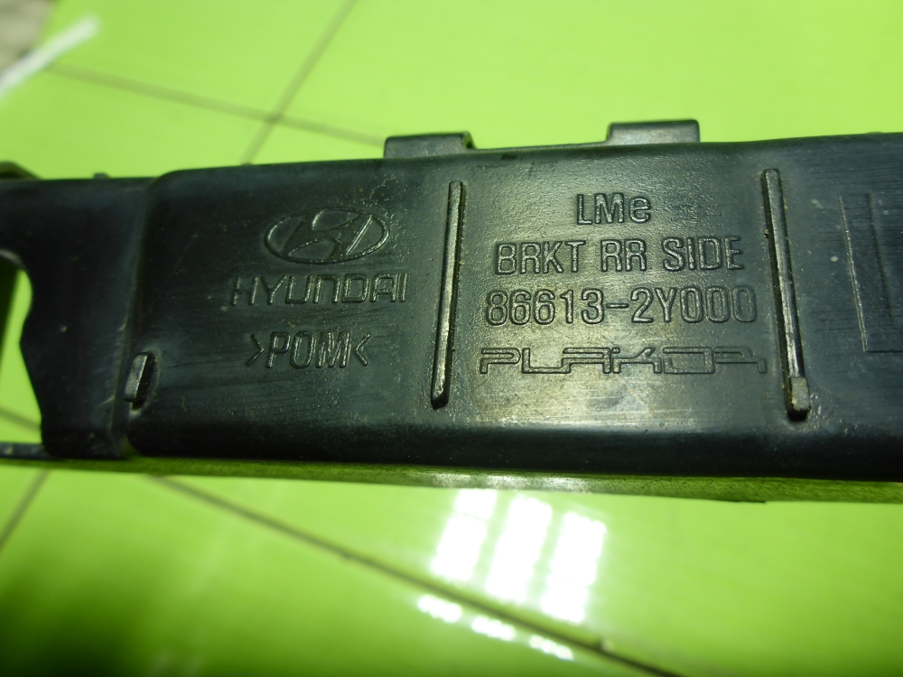 Кронштейн заднего бампера левый