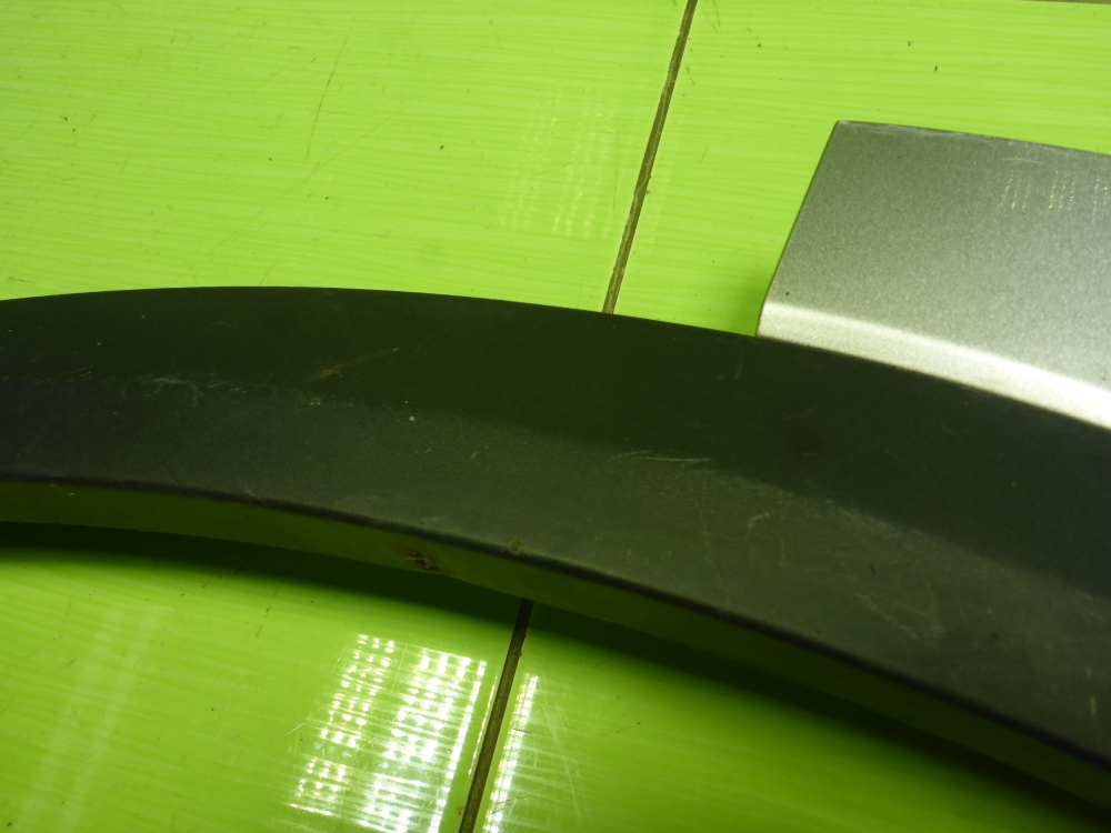 Накладка переднего крыла левого