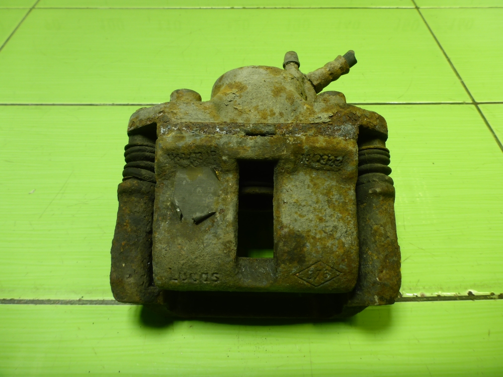 Суппорт передний левый