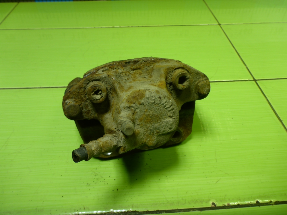 Суппорт передний левый