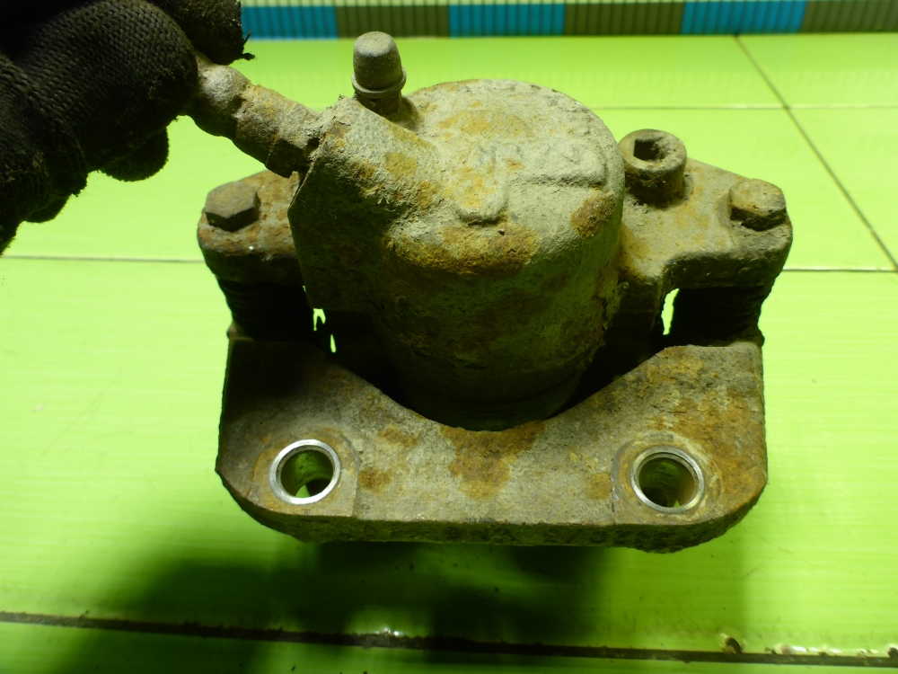 Суппорт передний левый