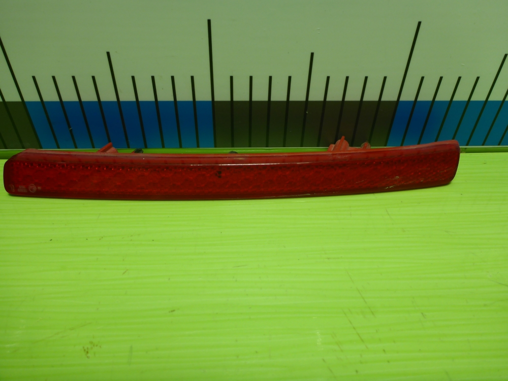 Отражатель в бампер задний левый