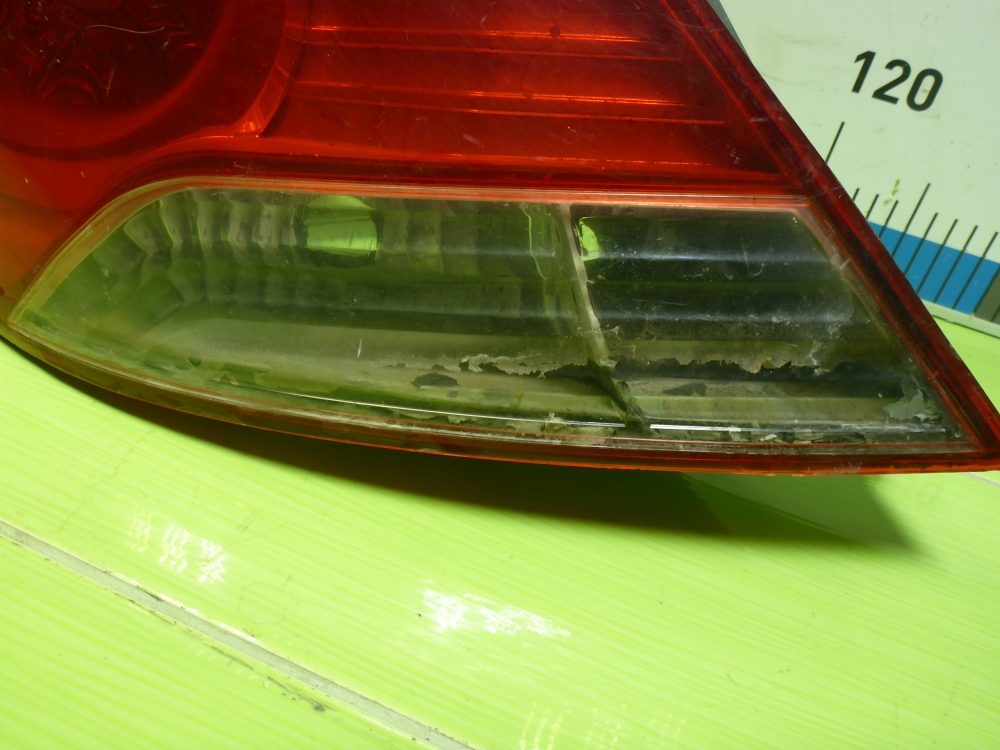 Фонарь задний наружный левый