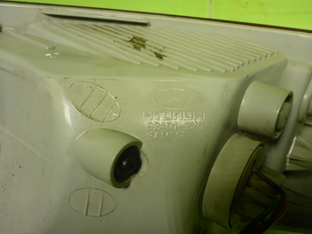 Фонарь задний наружный левый