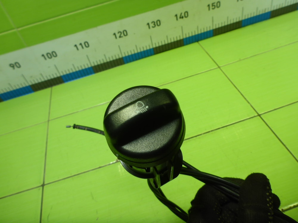 Кнопка корректора фар