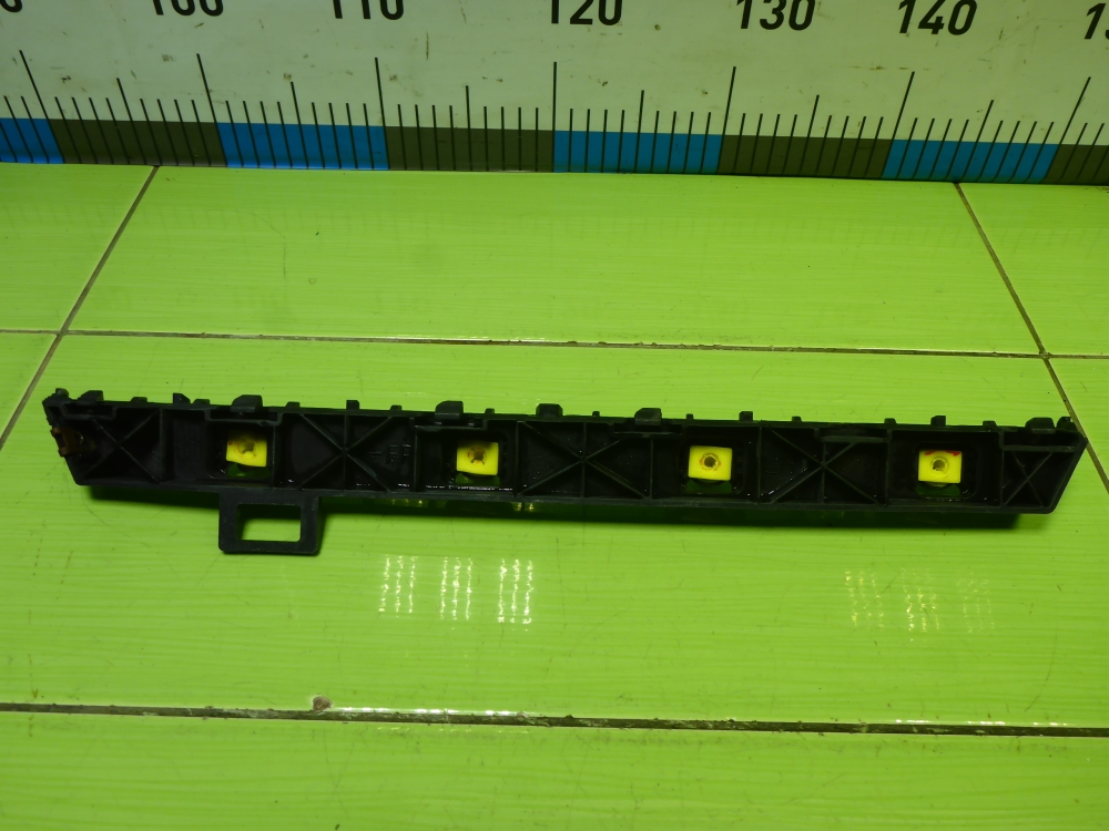 Кронштейн заднего бампера левый