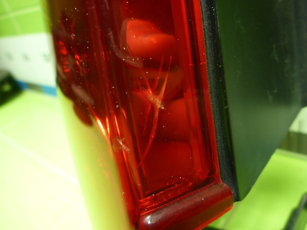 Фонарь задний левый