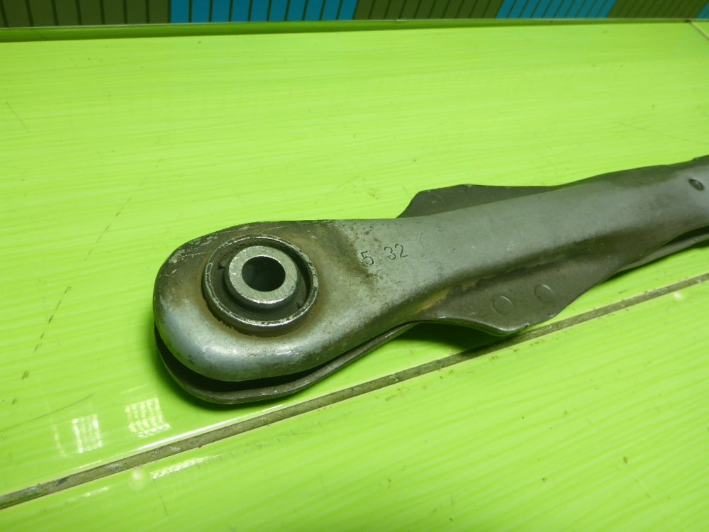 Рычаг задний нижний