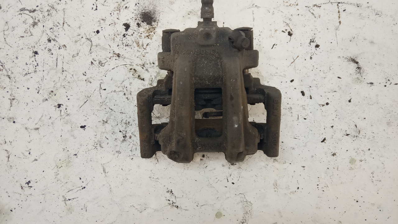 Суппорт задний левый