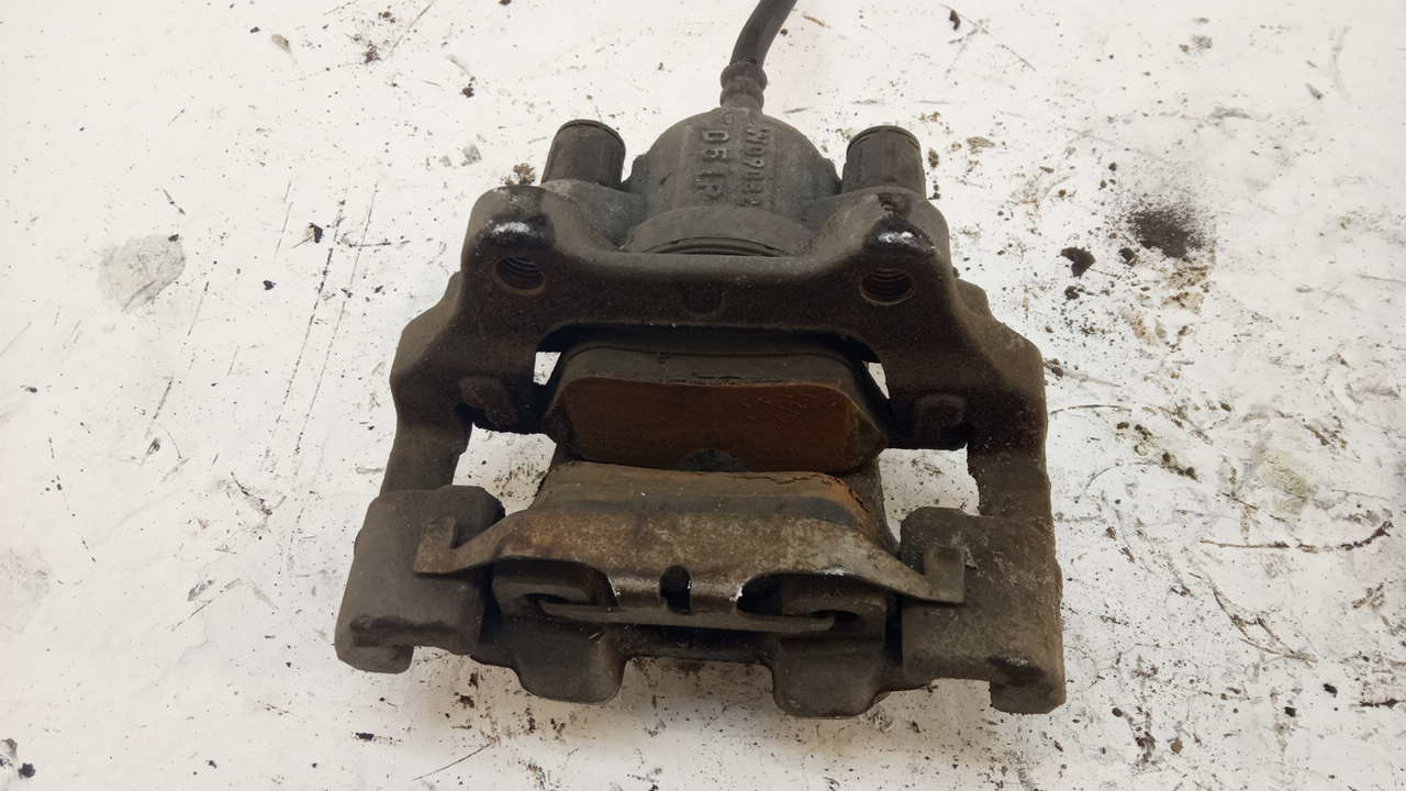 Суппорт задний левый