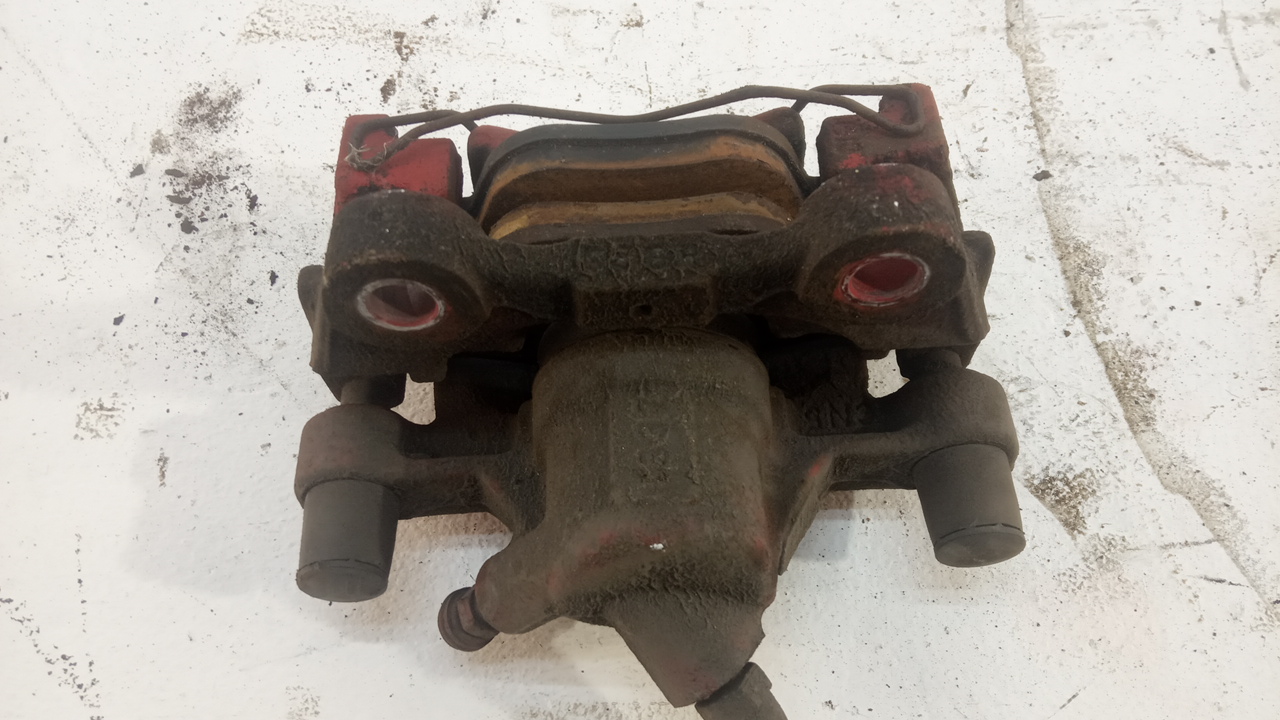 Суппорт задний левый