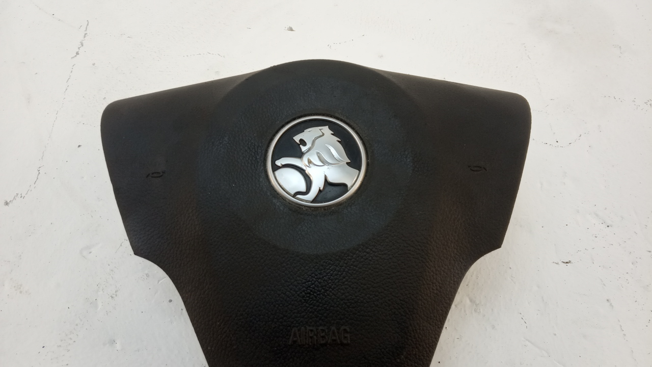 Подушка безопасности в рулевое колесо