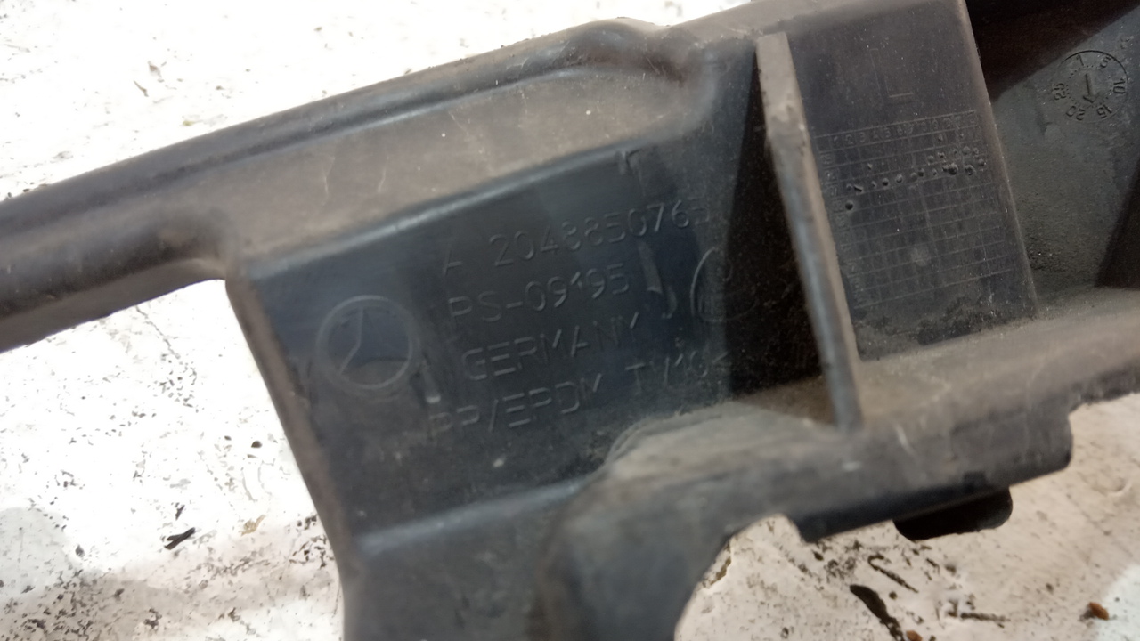 Кронштейн переднего бампера левый