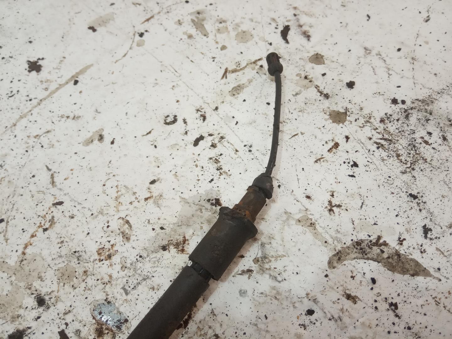 Трос стояночного тормоза левый