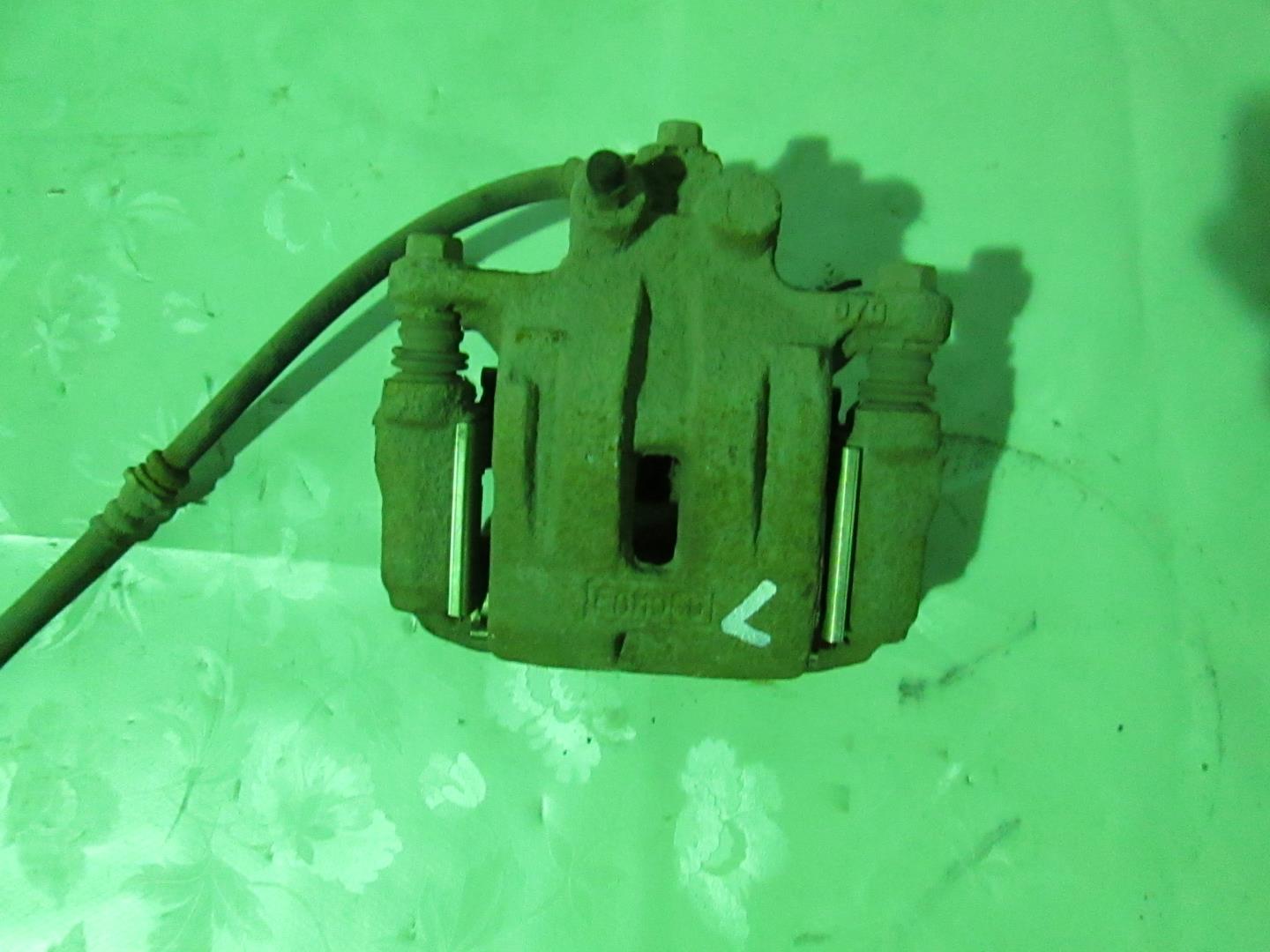 Суппорт задний левый