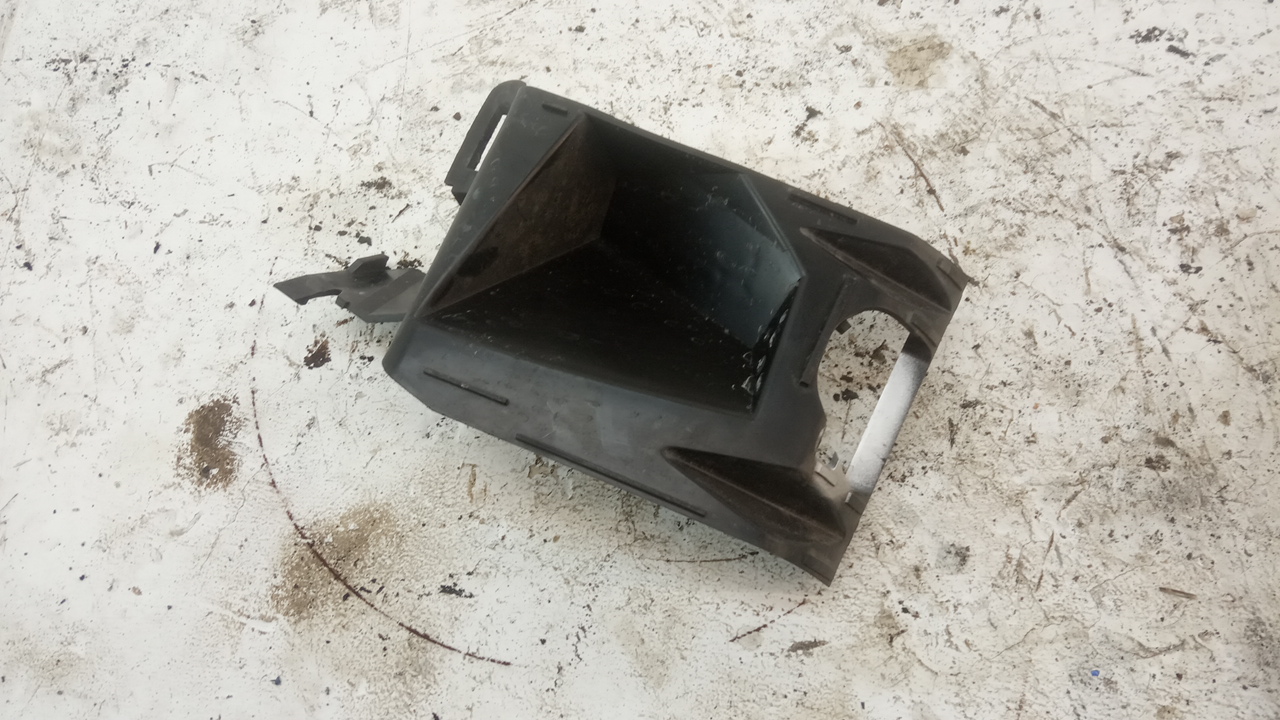 Кронштейн форсунки омывателя фары