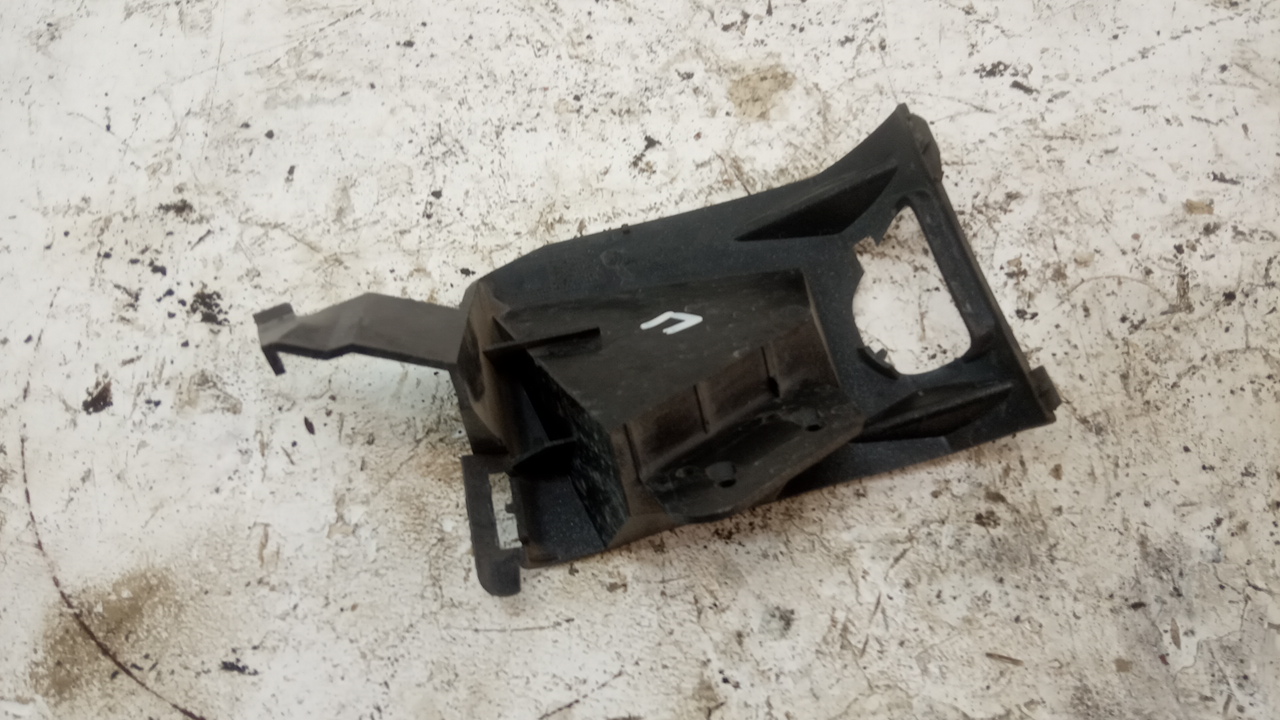 Кронштейн форсунки омывателя фары