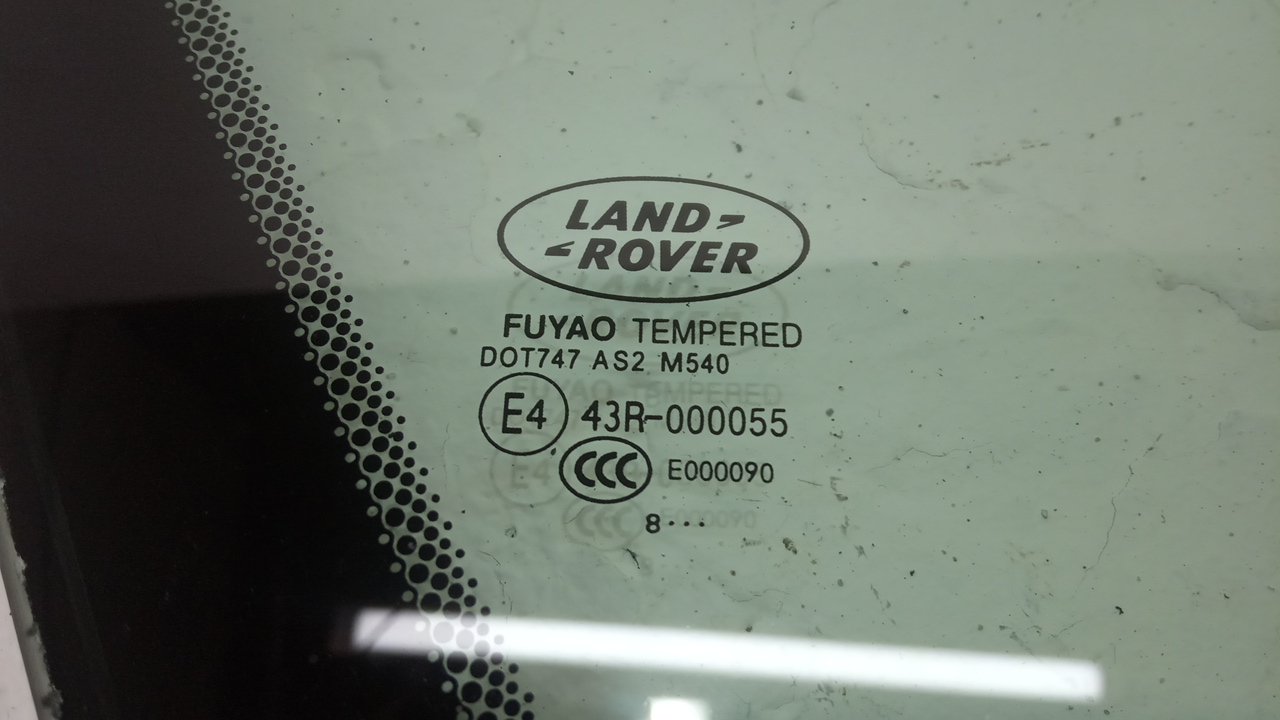 Стекло кузовное глухое левое