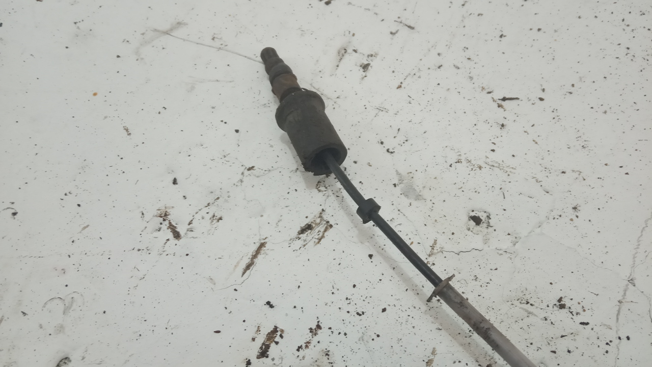 Трос стояночного тормоза левый