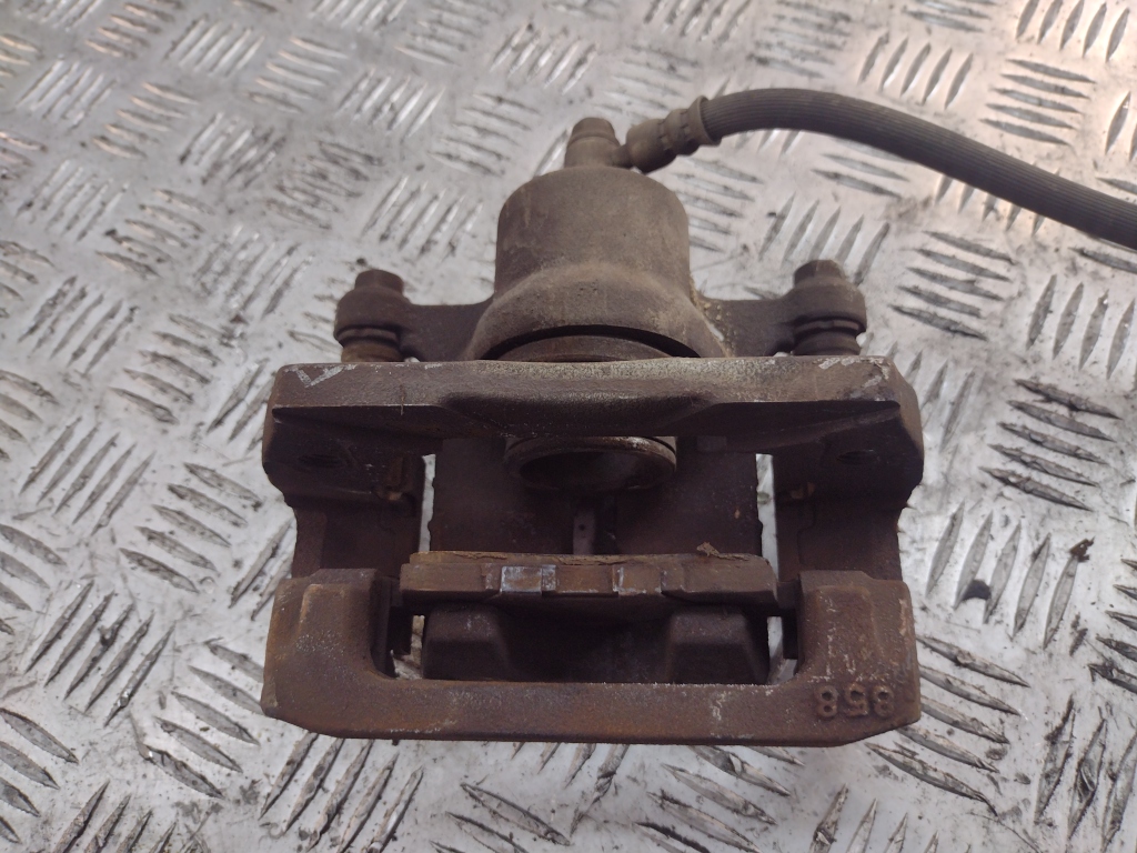 Суппорт задний левый