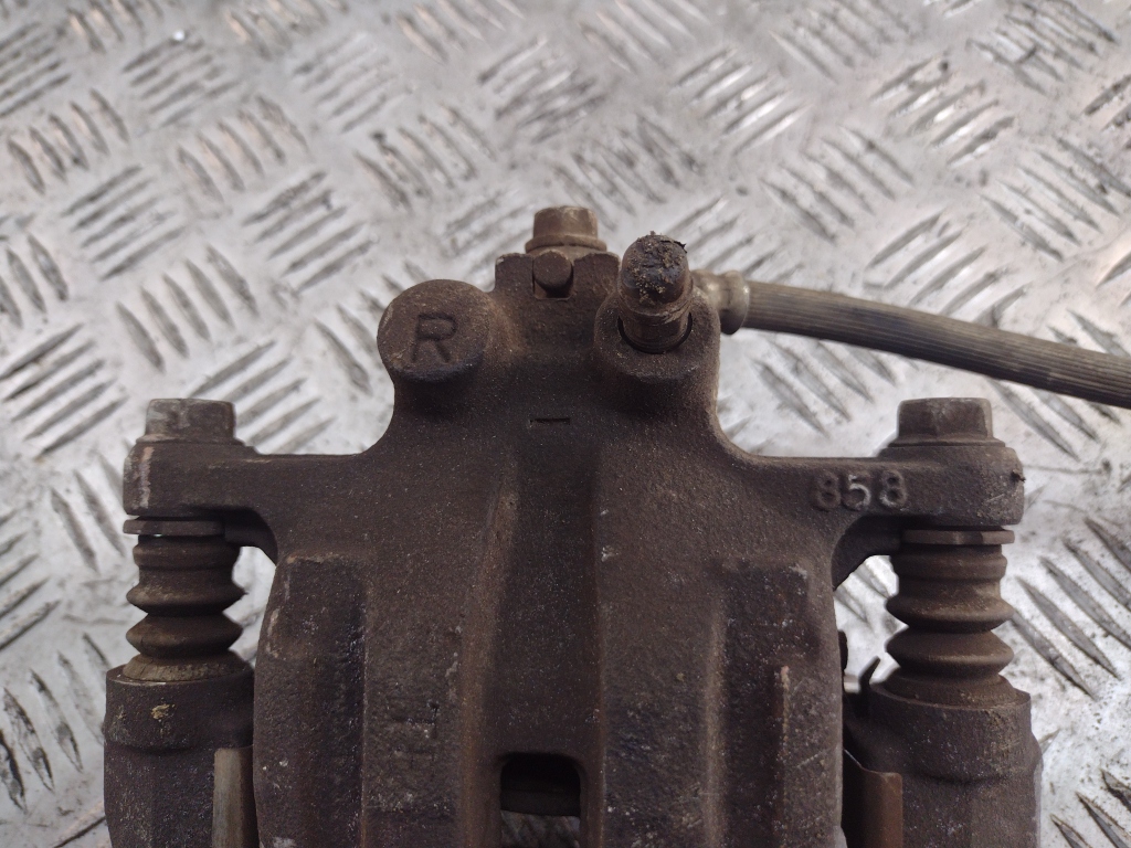 Суппорт задний правый