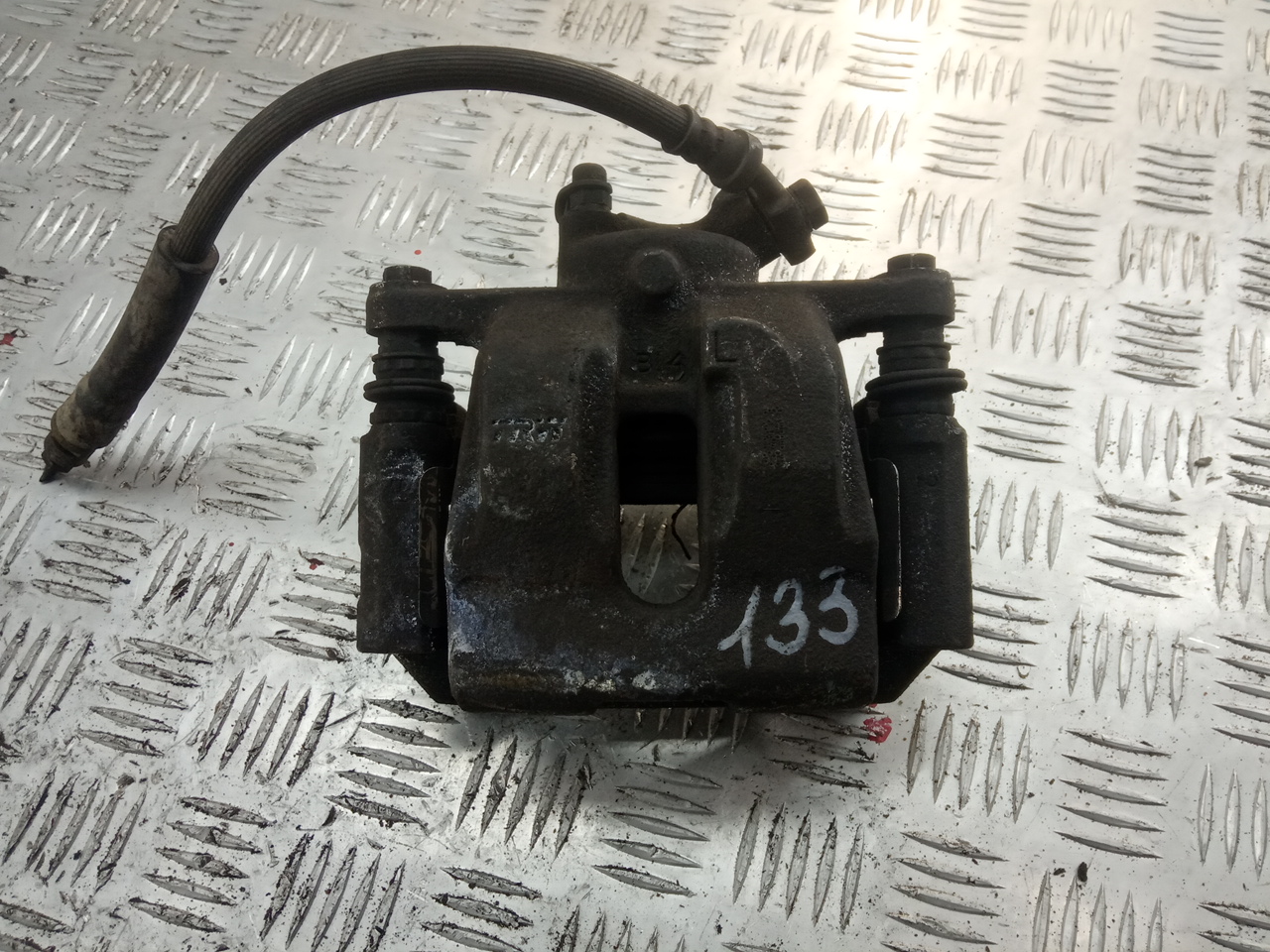 Суппорт задний левый