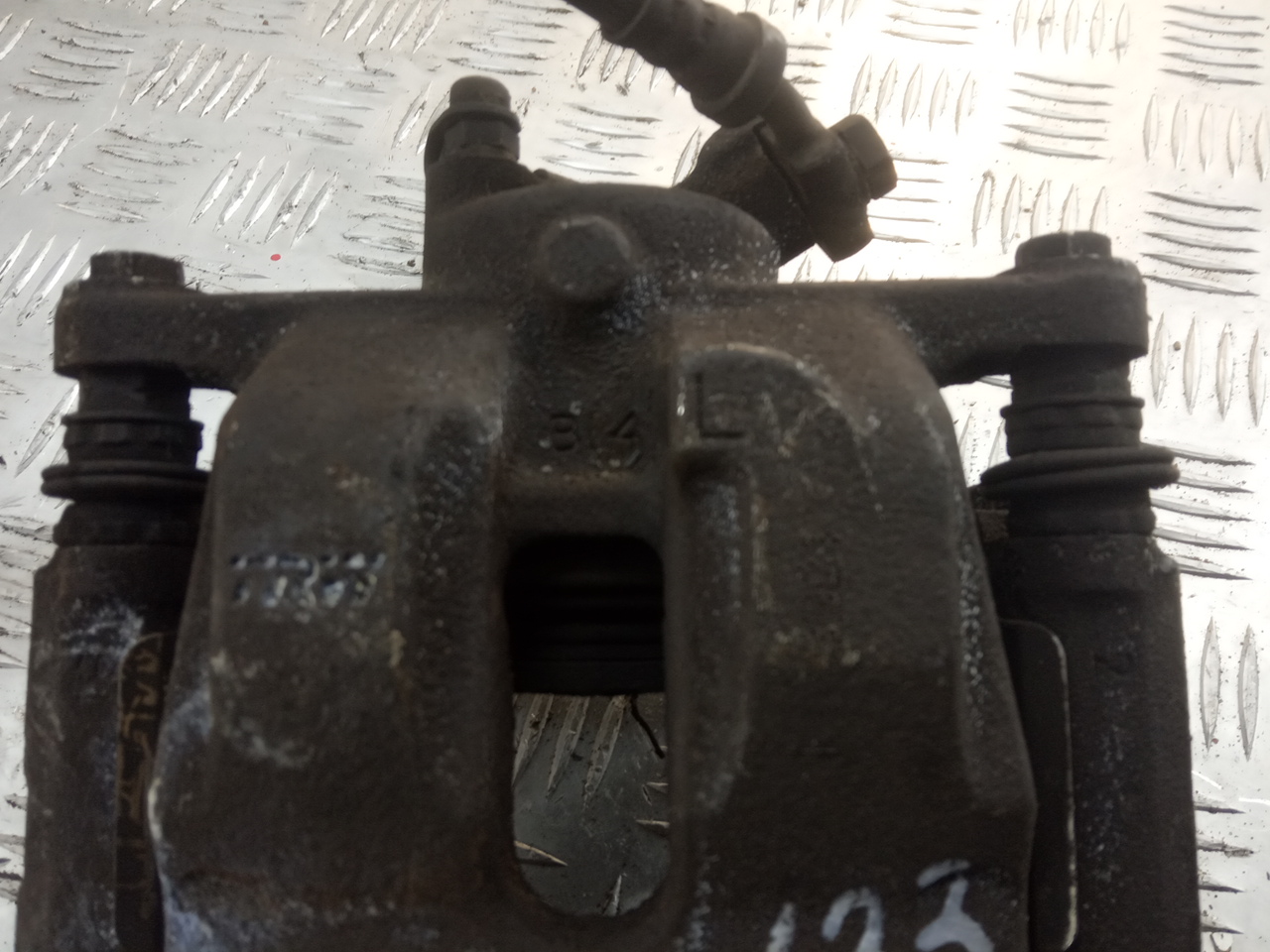 Суппорт задний левый