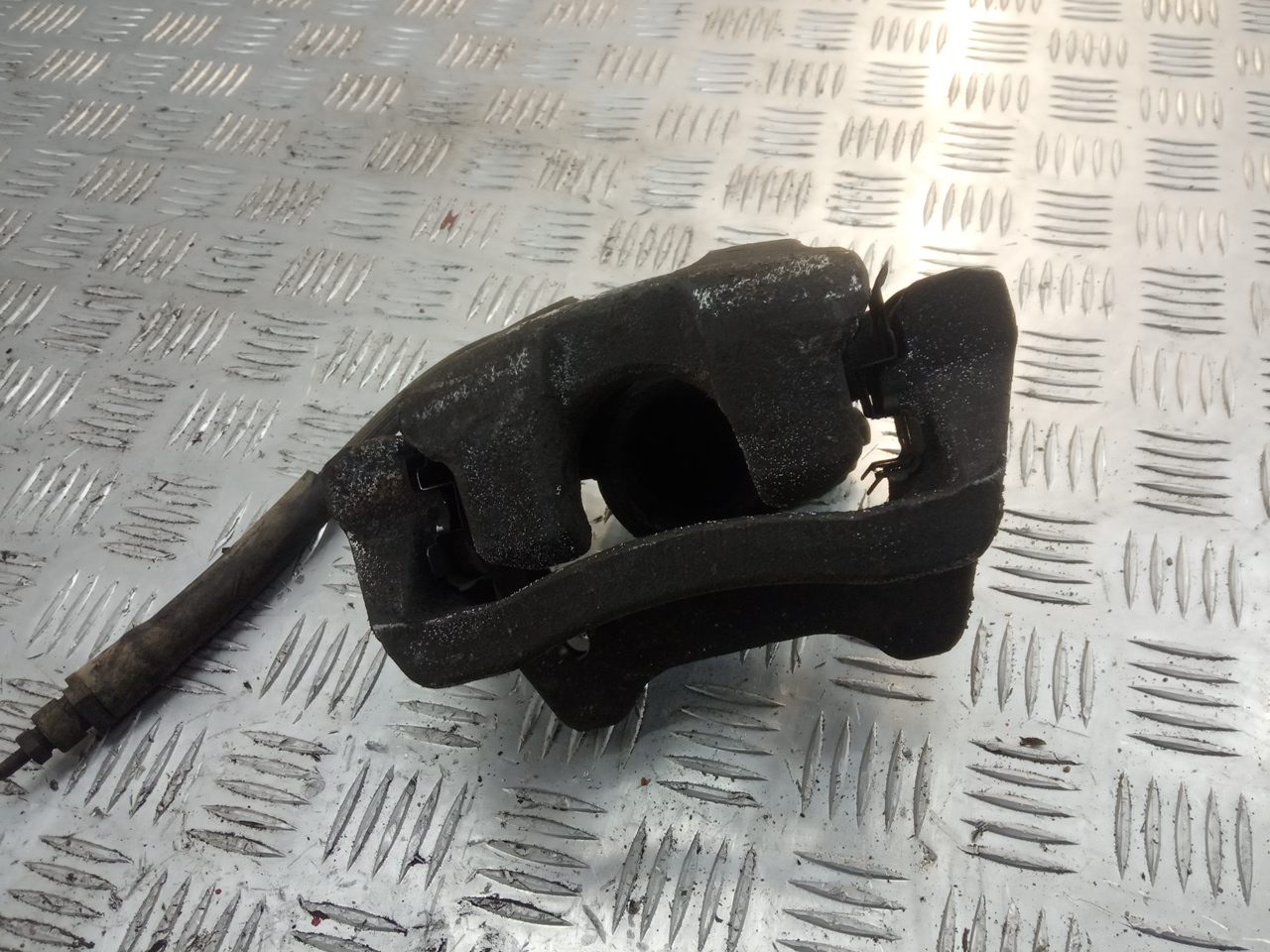 Суппорт задний левый