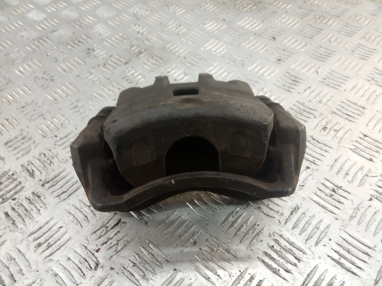 Суппорт передний левый