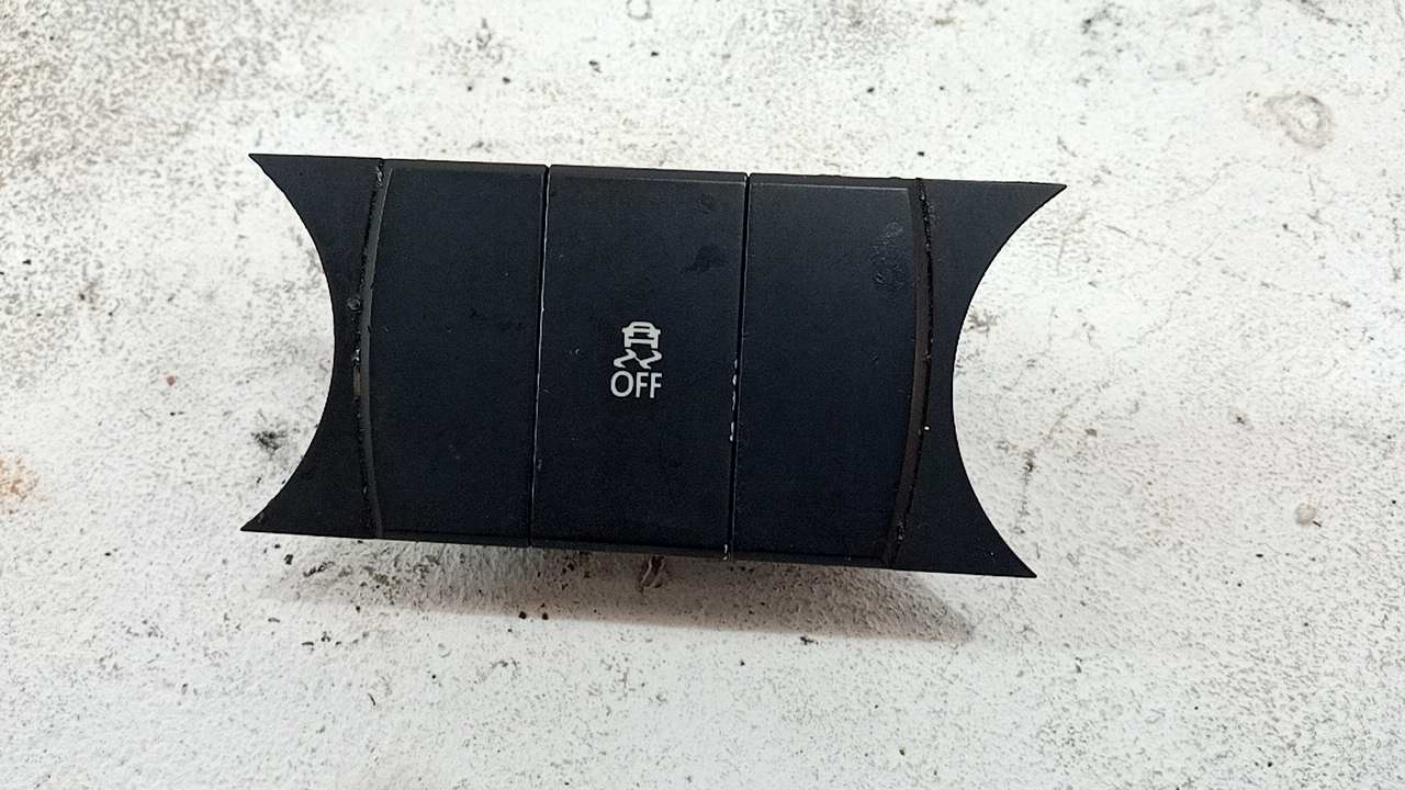 Кнопка антипробуксовочной системы