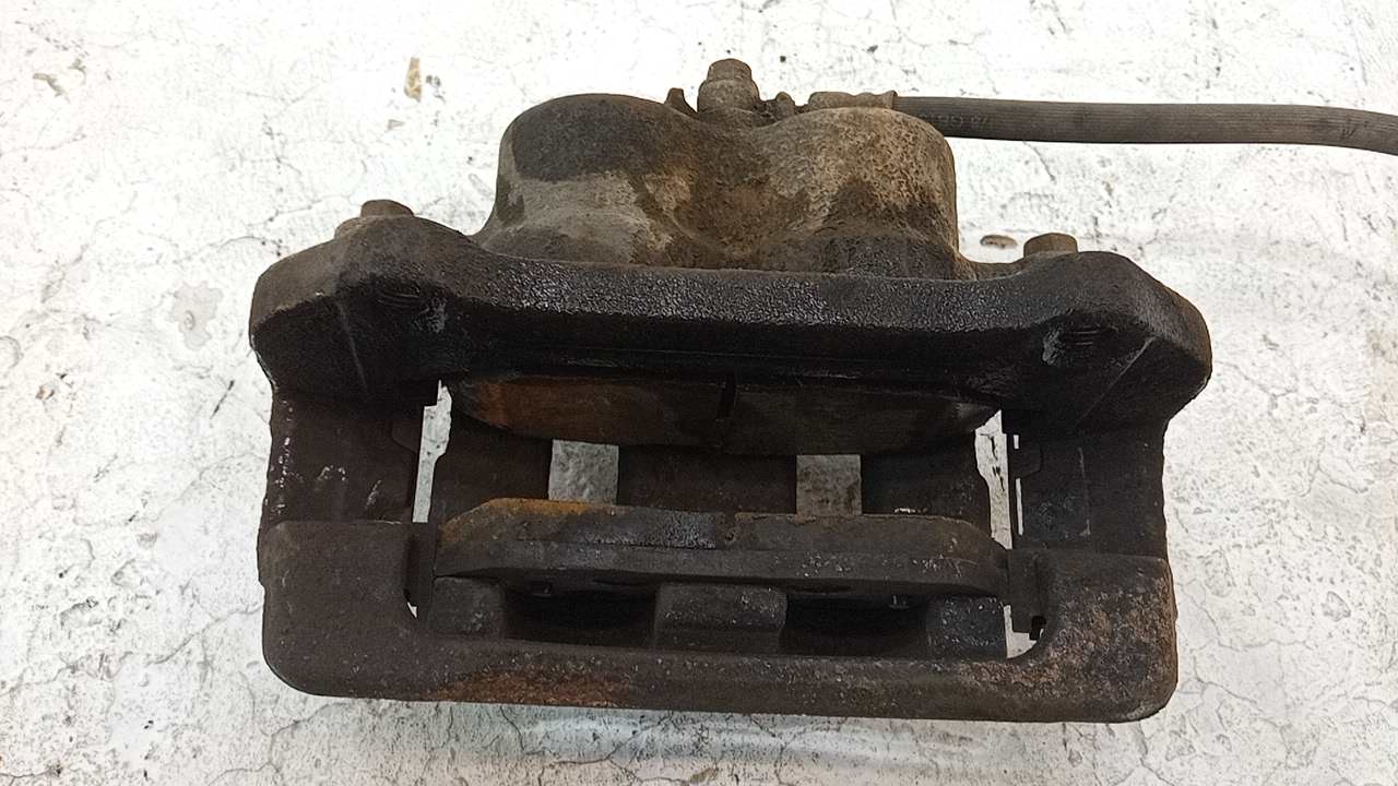 Суппорт передний левый