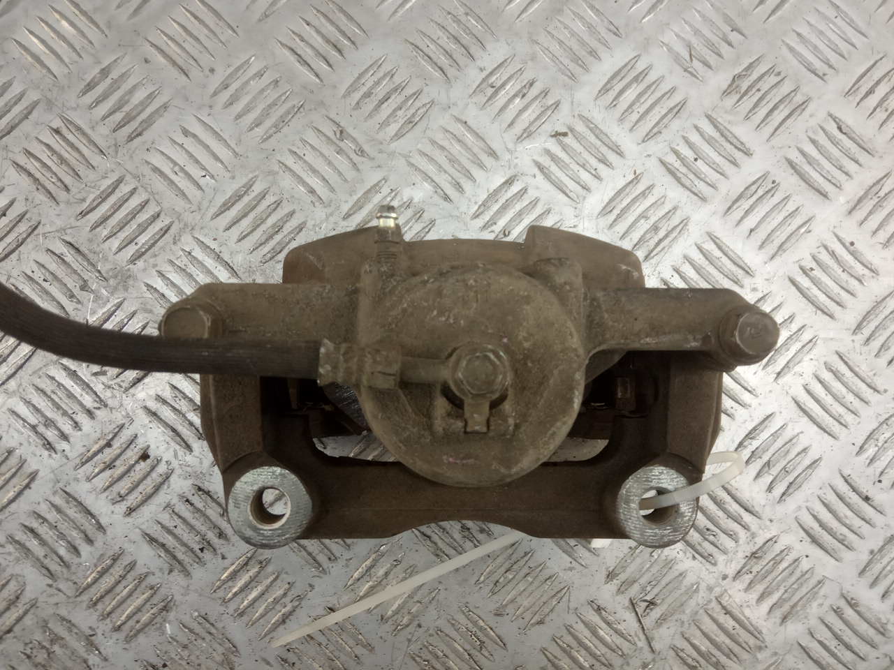 Суппорт передний левый