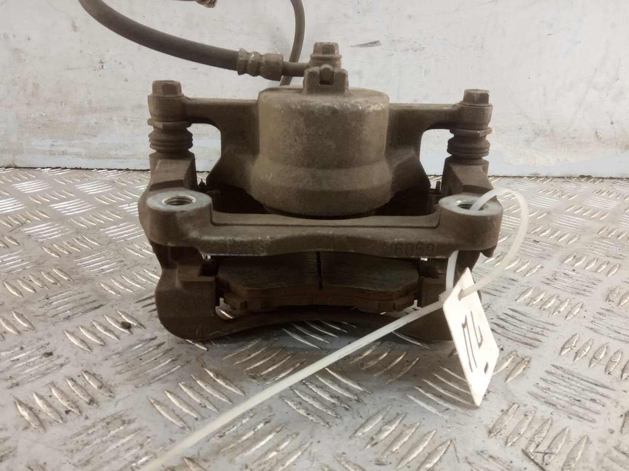 Суппорт передний левый