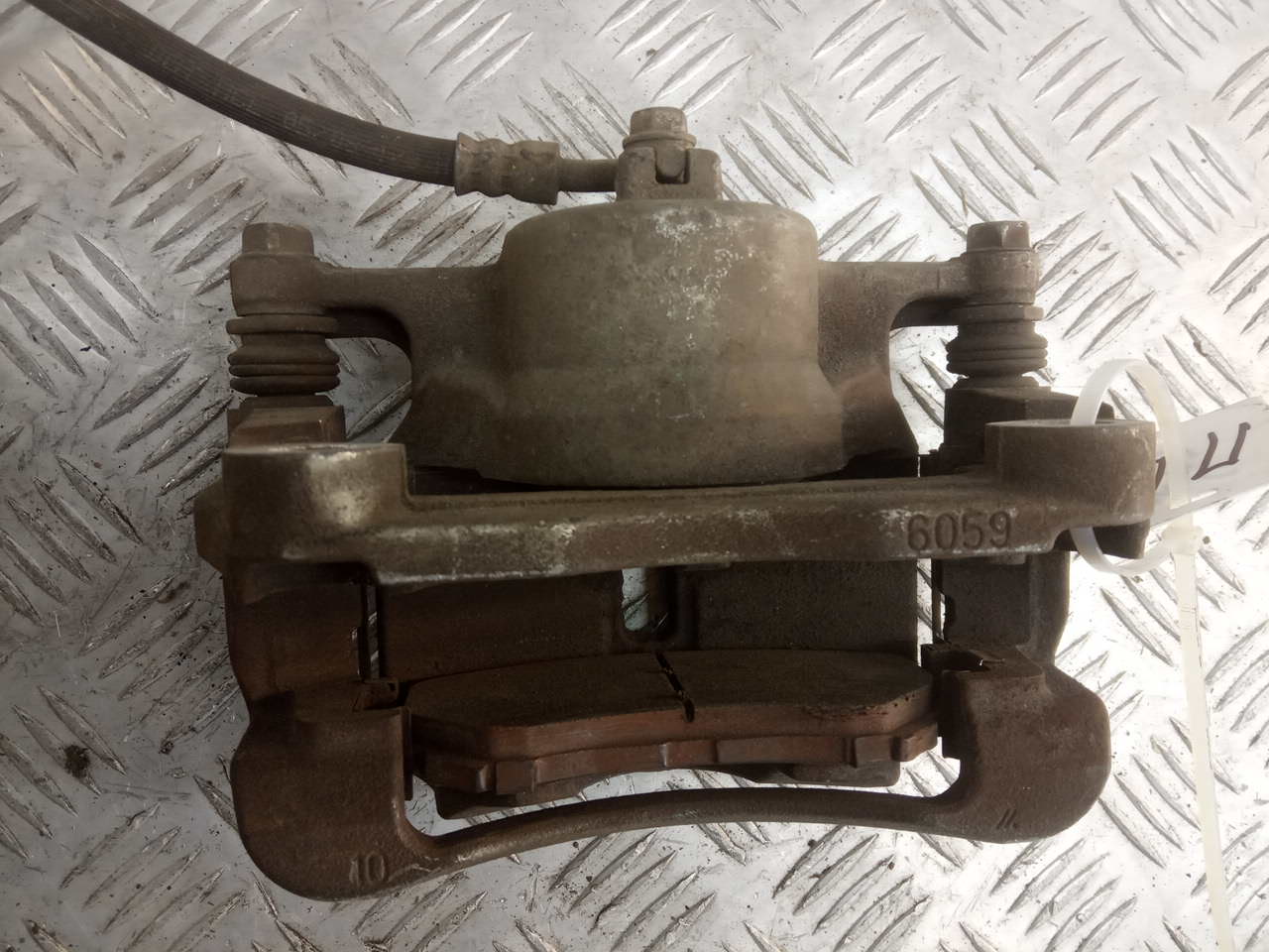 Суппорт передний левый