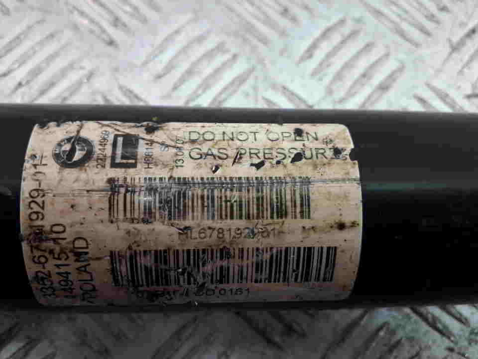 Амортизатор задний левый