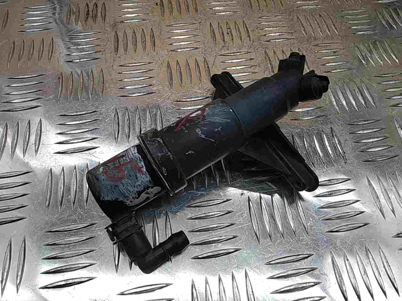 Форсунка омывателя фары