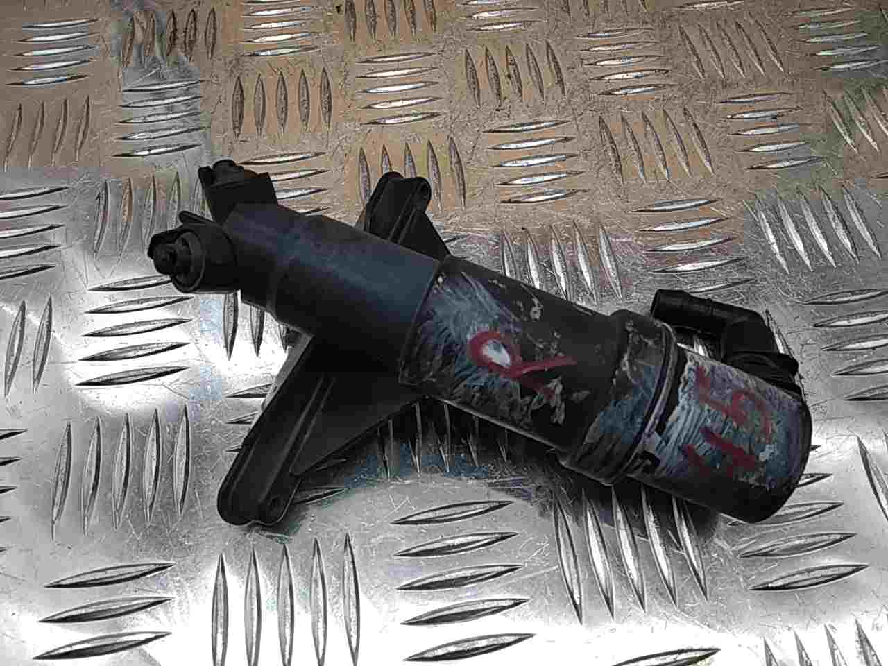 Форсунка омывателя фары