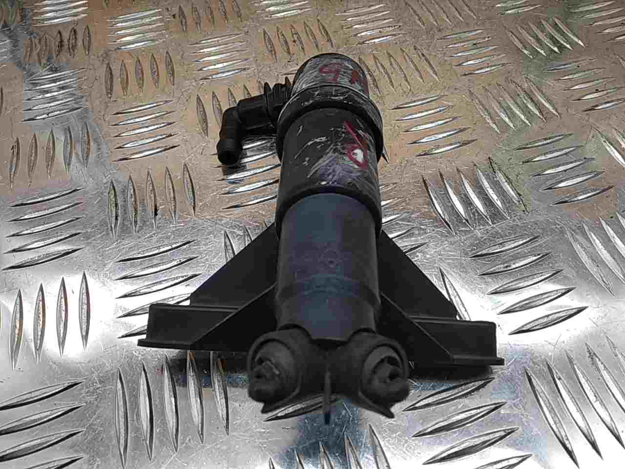 Форсунка омывателя фары