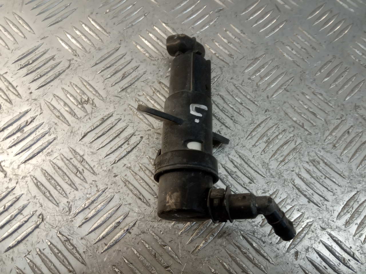 Форсунка омывателя фары