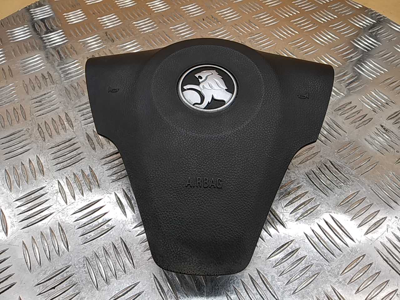 Подушка безопасности в рулевое колесо