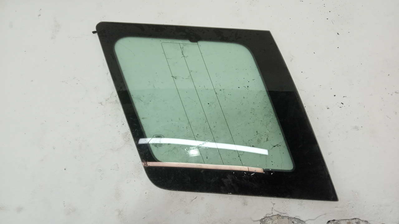 Стекло кузовное глухое левое