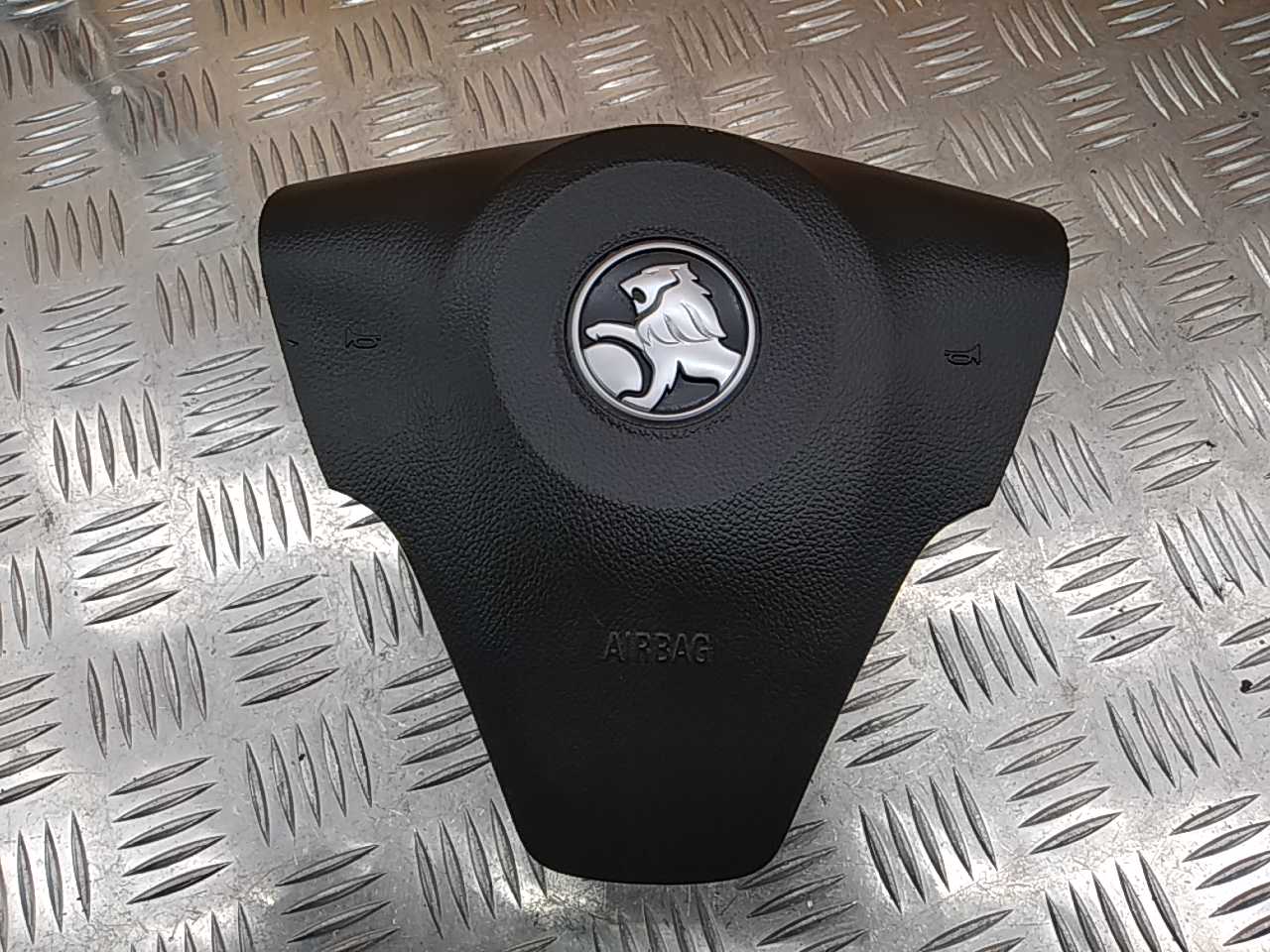 Подушка безопасности в рулевое колесо