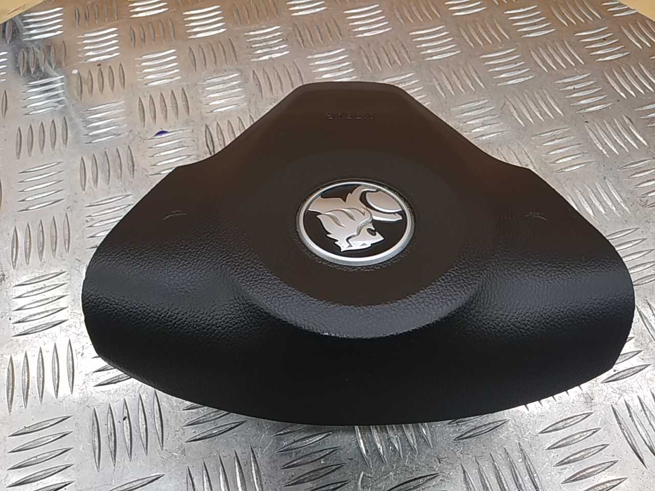 Подушка безопасности в рулевое колесо