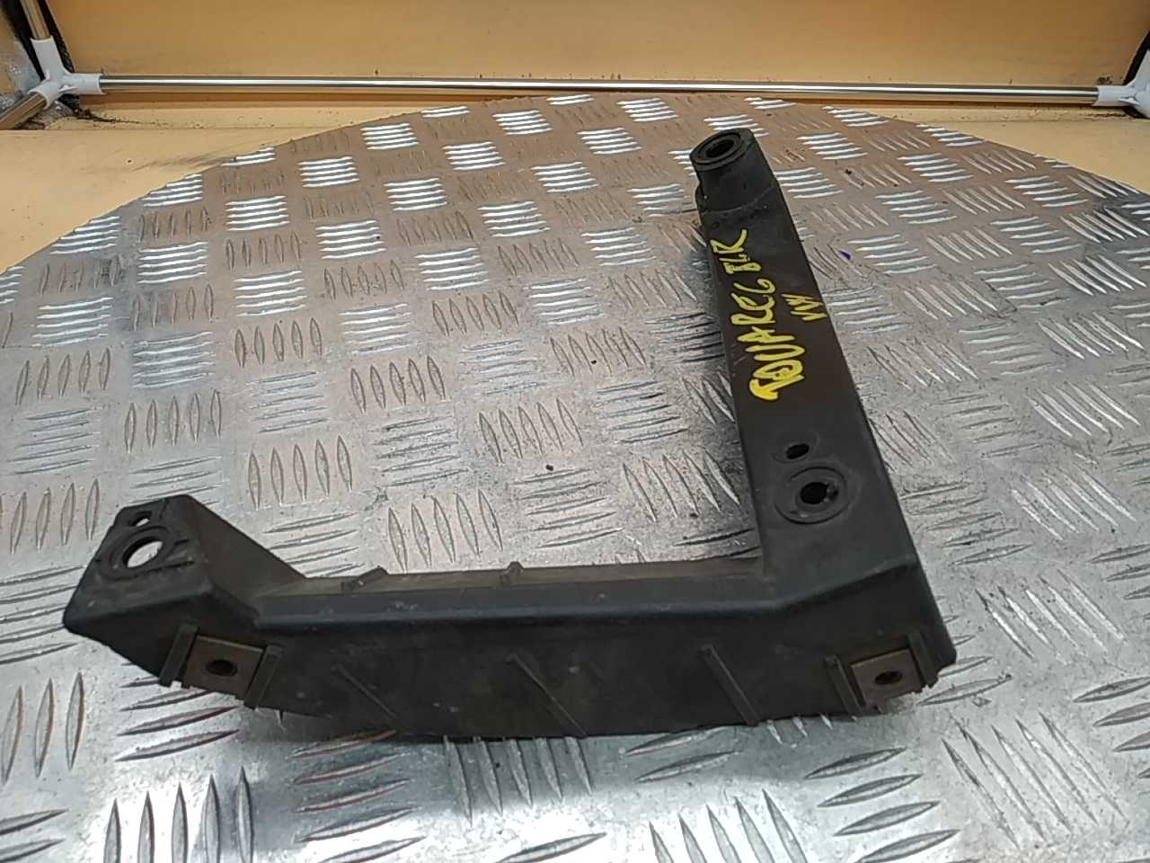 Кронштейн заднего бампера левый