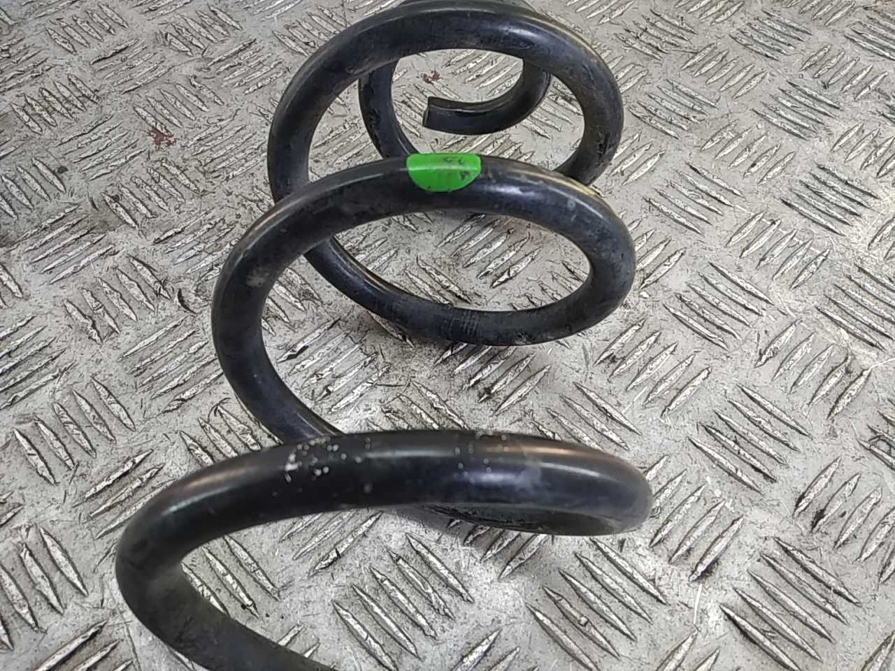 Пружина задняя