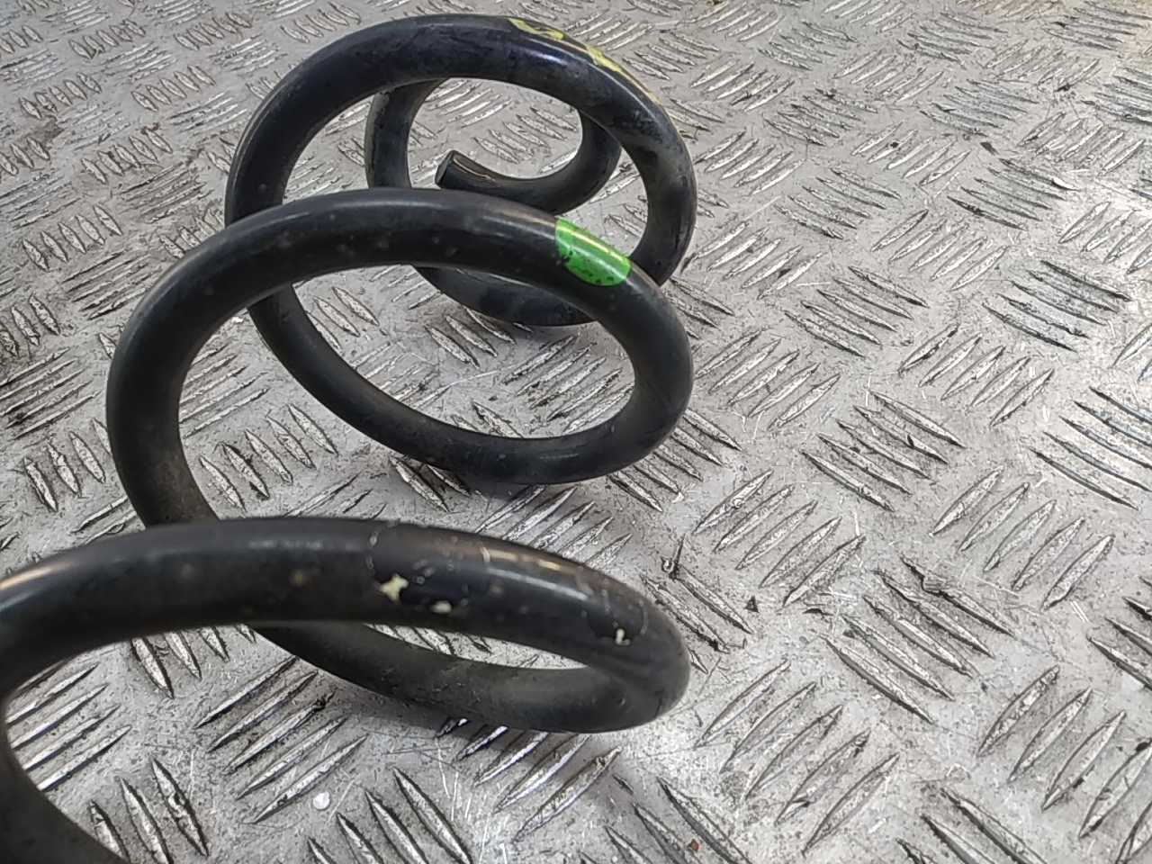 Пружина задняя